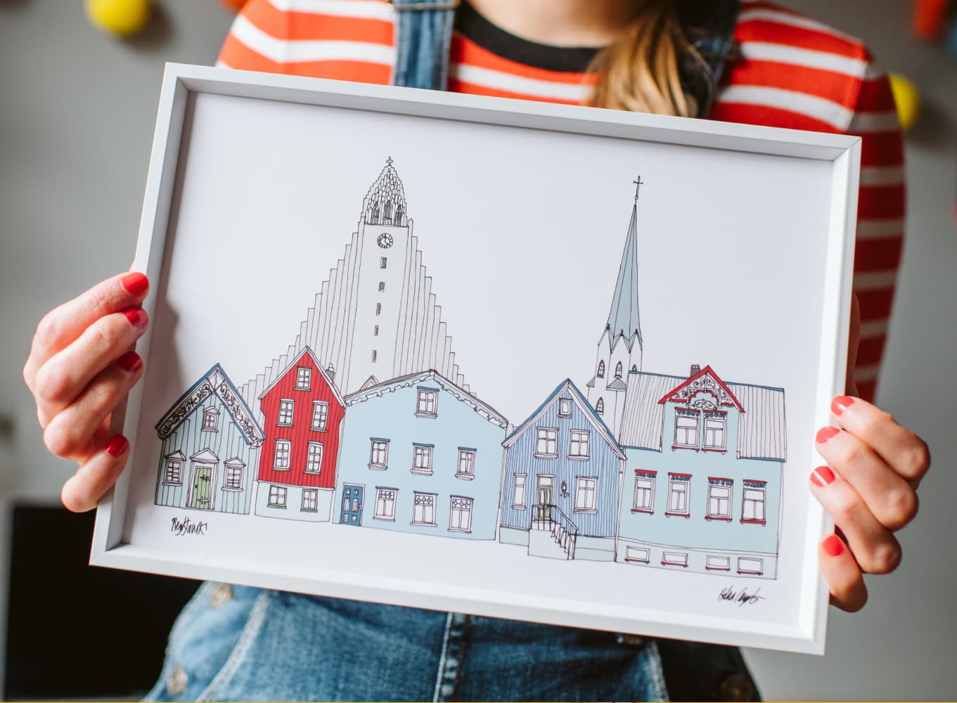 Photo of a Reykjavik illustration print in a frame