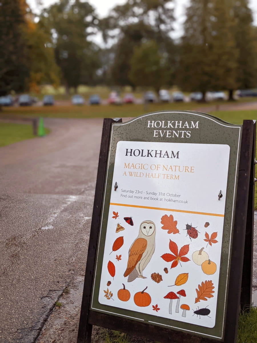 Sign at Holkham Hall featuring autumn design